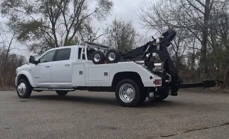 Philadelphia wrecker equipment securing damaged vehicle
